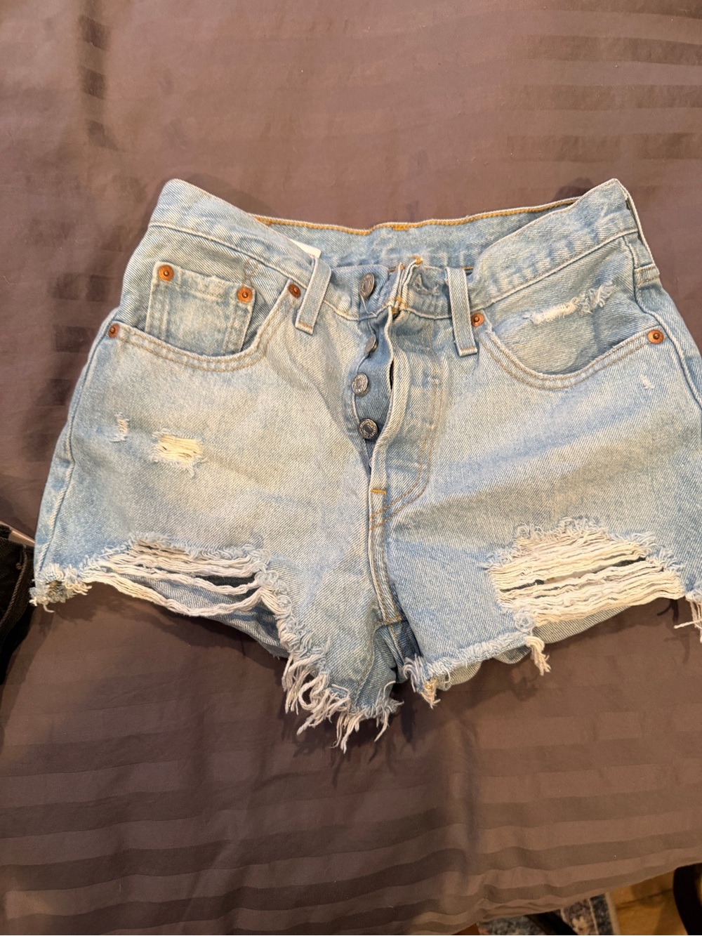 Levi’s women’s shorts distressed light blue 501 size 25